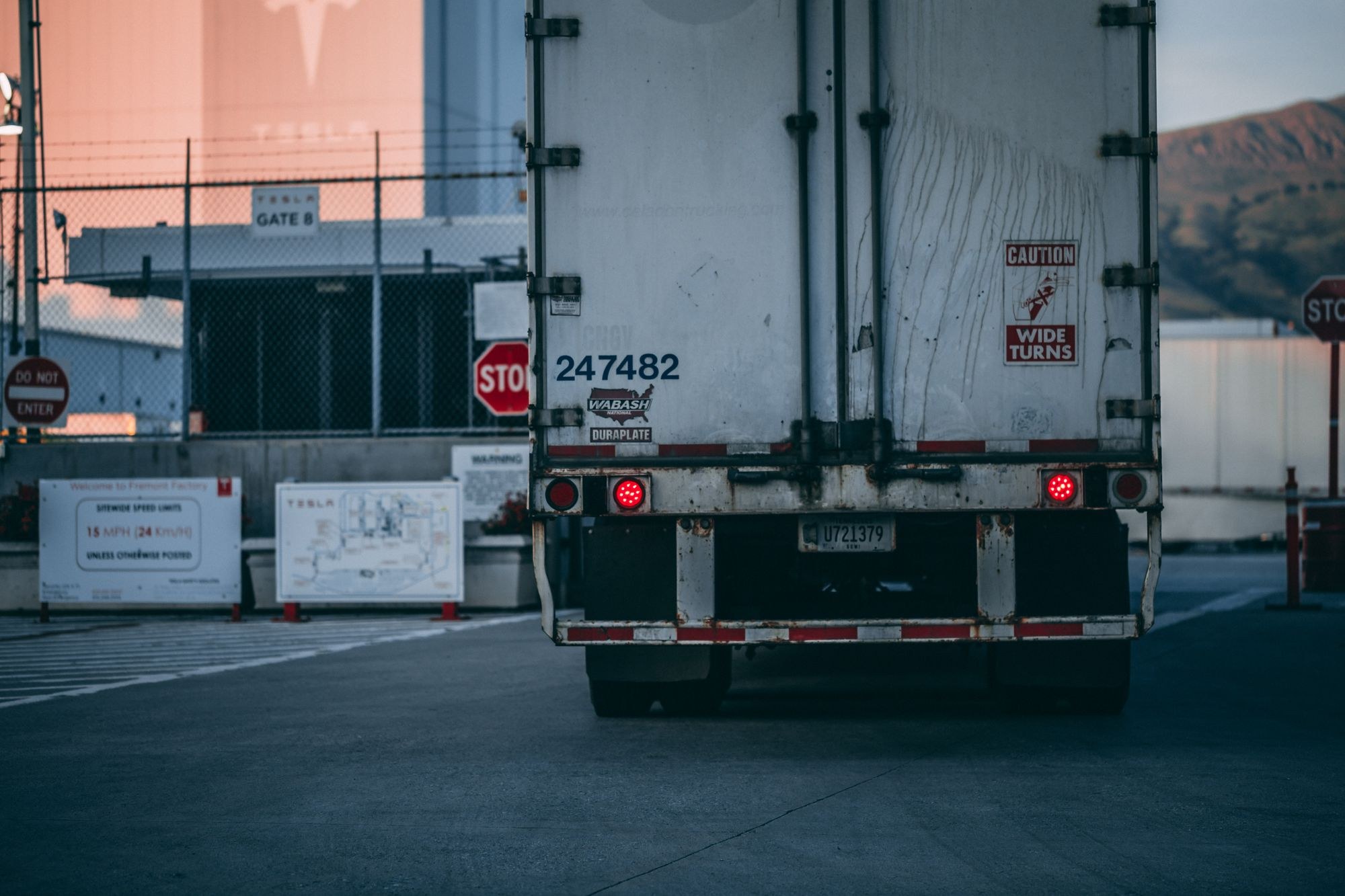 Rear of a freight trailer at an industrial loading entrance
